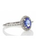 18ct White Gold Diamond And Tanzanite Halo Setting Ring 0.15 Carats